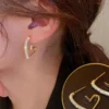 Korean Heart-Shaped Gold Plated Earrings for Women and Girls – Trendy Love-Inspired Jewelry Korean Heart-Shaped Gold Plated Earrings for Women and Girls – Trendy Love-Inspired Jewelry
