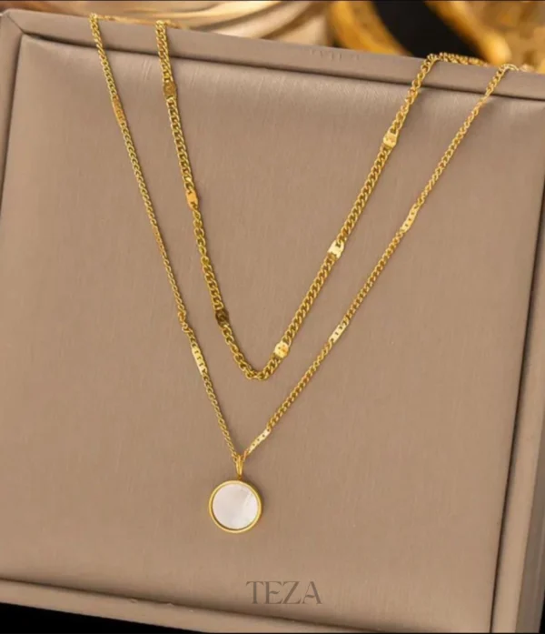 Layered Gold Necklace with Round Pearl-Like Pendant – Elegant Multi-Chain Jewelry for Women Layered Gold Necklace with Round Pearl-Like Pendant – Elegant Multi-Chain Jewelry for Women