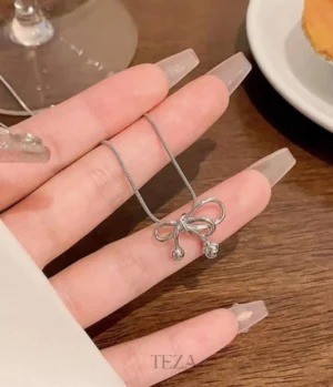 Stella Creations Silver Bow Necklace Stella Creations Silver Bow Necklace